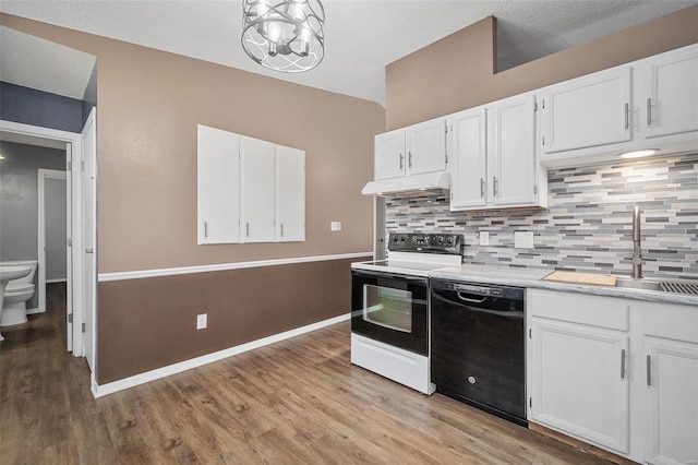 kitchen with sink, white electric range, tasteful backsplash, black dishwasher, and white cabinets