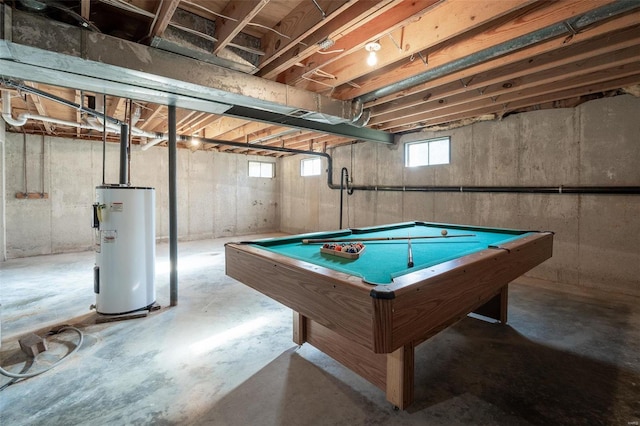 playroom with electric water heater, pool table, and concrete floors