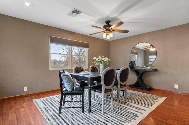 dining area featuring ceiling fan and hardwood / wood-style floors