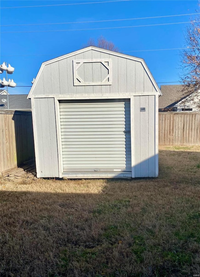 garage featuring a yard