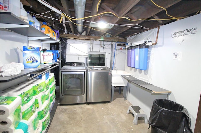 laundry room featuring separate washer and dryer and sink