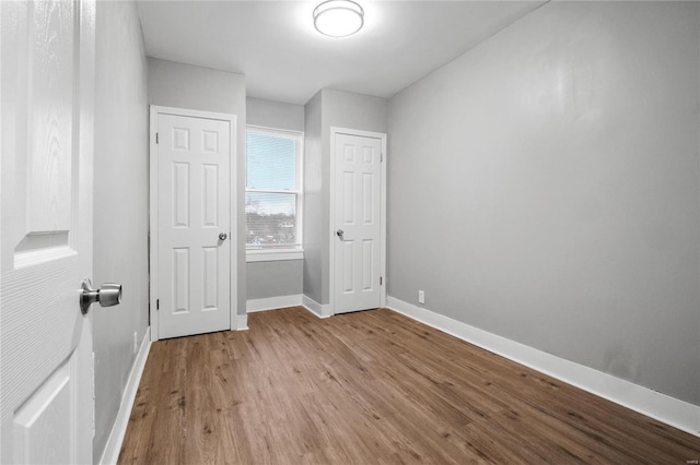 unfurnished bedroom with light hardwood / wood-style floors