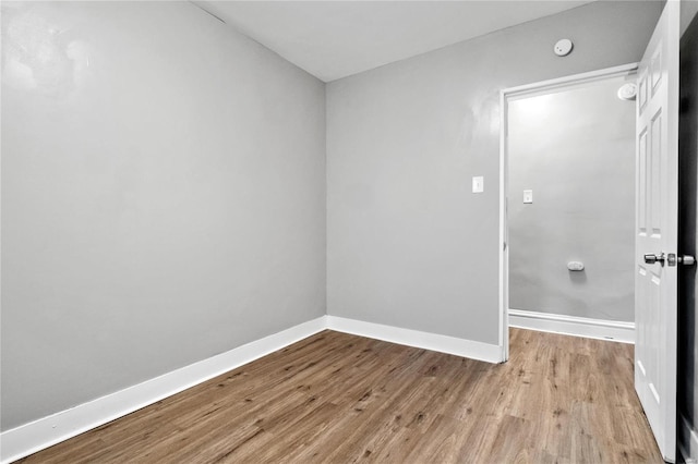 unfurnished room featuring light hardwood / wood-style flooring