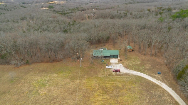 birds eye view of property featuring a rural view