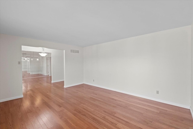 empty room featuring light hardwood / wood-style floors