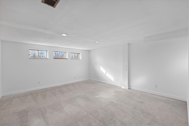 basement with light carpet