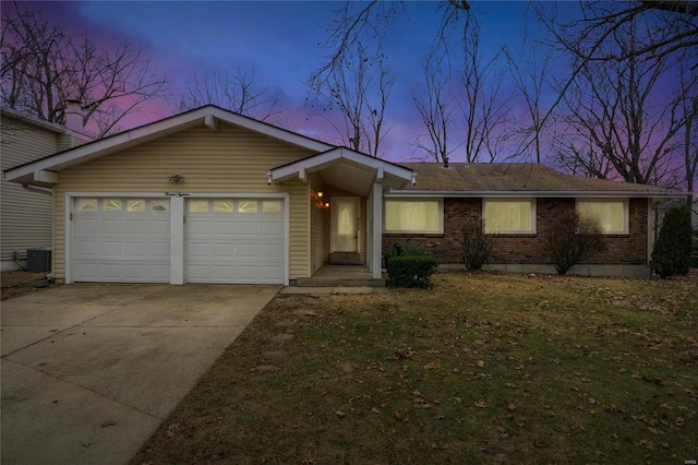 ranch-style home with a garage