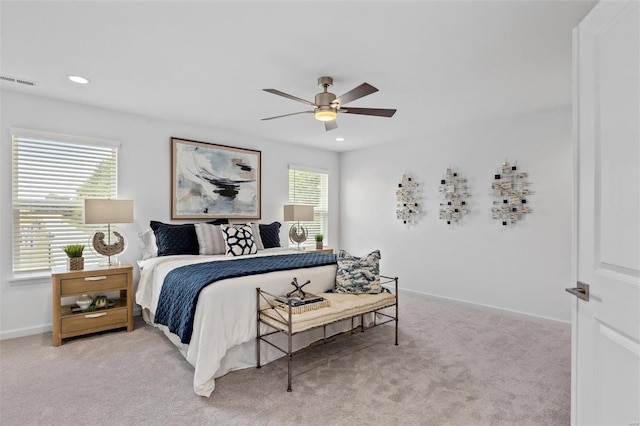 carpeted bedroom with ceiling fan