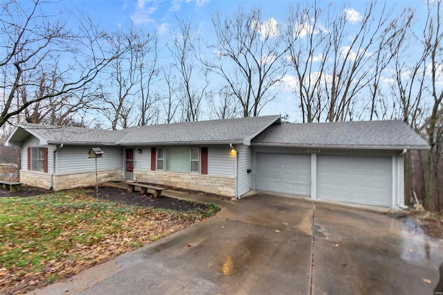 ranch-style home with a garage