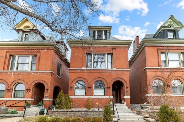 view of front of property featuring brick siding