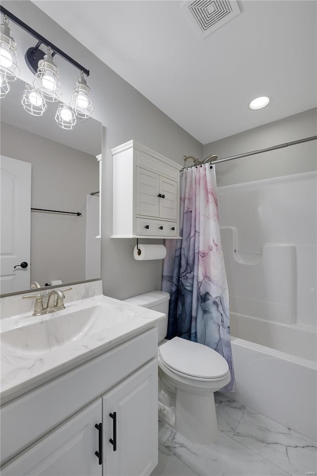 bathroom with toilet, vanity, visible vents, marble finish floor, and shower / bath combination with curtain