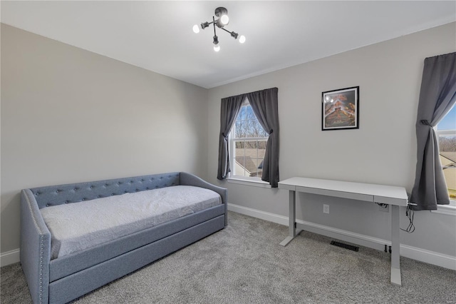 living area with carpet floors and baseboards