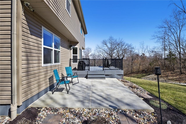 view of patio / terrace featuring a wooden deck