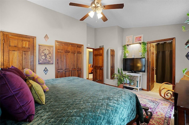 bedroom featuring carpet flooring, ceiling fan, and vaulted ceiling