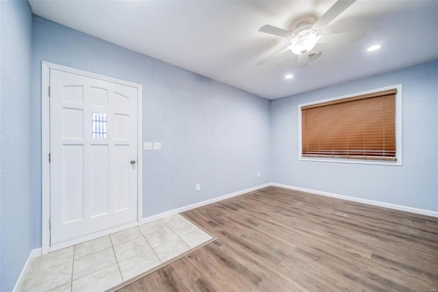 entryway featuring light hardwood / wood-style floors and ceiling fan