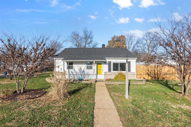 view of front of home with a front yard