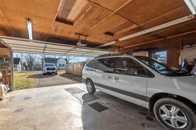 garage featuring a garage door opener