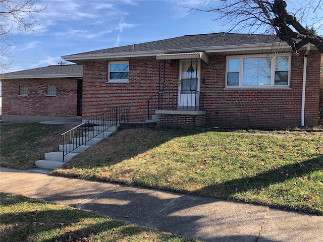 view of front of home with a front lawn