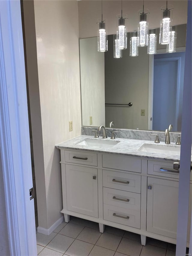 bathroom featuring tile patterned floors and vanity