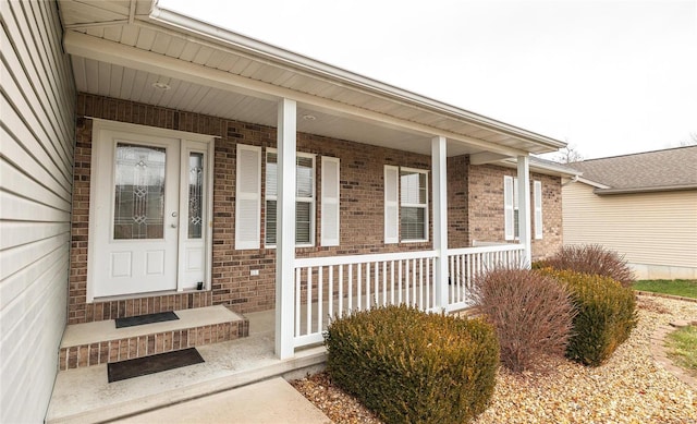 doorway to property featuring a porch