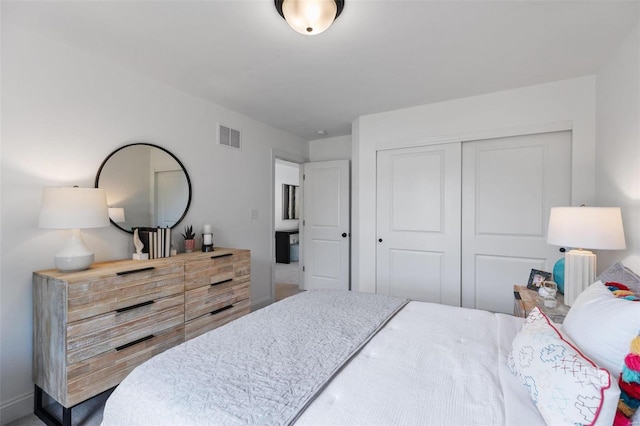 bedroom with carpet flooring and a closet