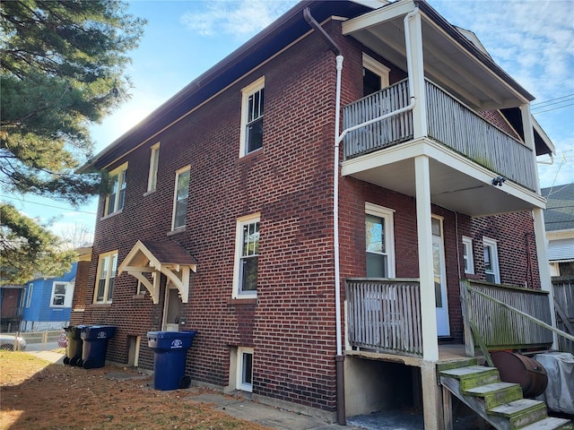 view of property exterior with a balcony