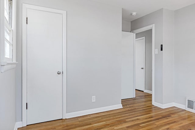 unfurnished bedroom with light hardwood / wood-style floors