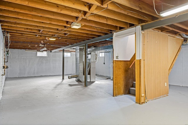 basement featuring heating unit