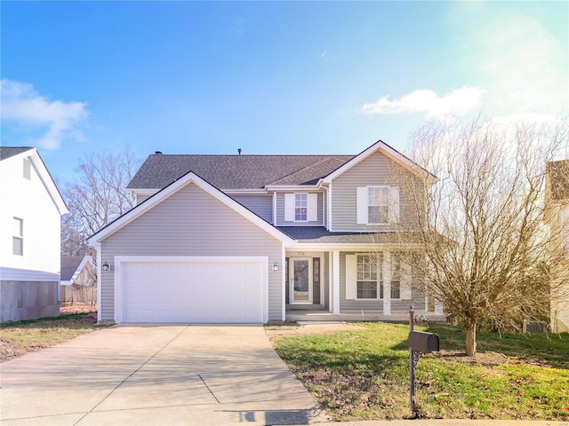 view of front of house with covered porch and a garage