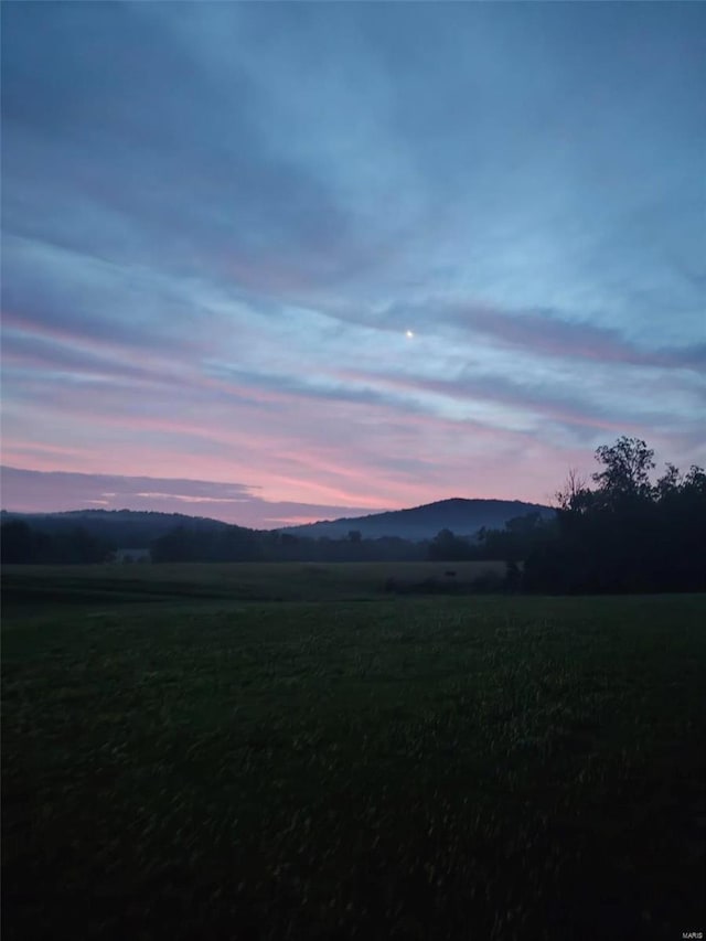 property view of mountains with a rural view