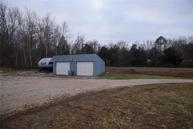 view of outdoor structure with a garage