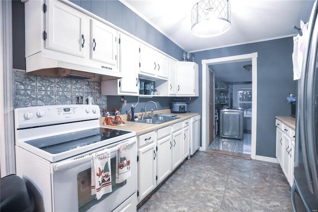 kitchen featuring white electric range, washer / dryer, sink, crown molding, and white cabinets