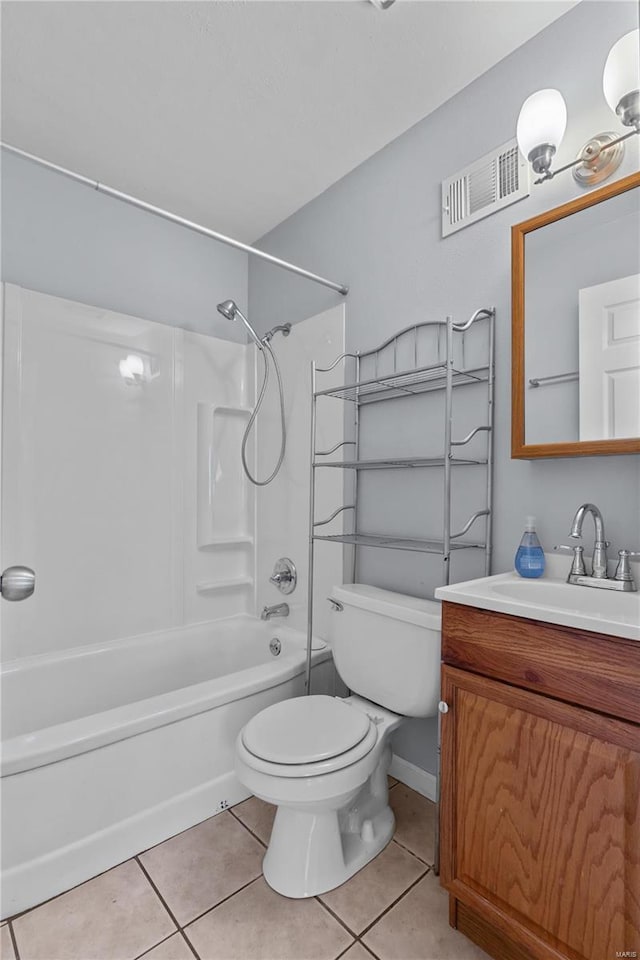 full bathroom featuring tile patterned flooring, vanity, toilet, and shower / bath combination