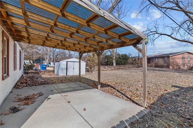 view of patio featuring a storage shed