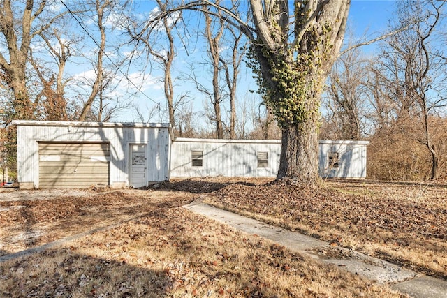 exterior space featuring a garage