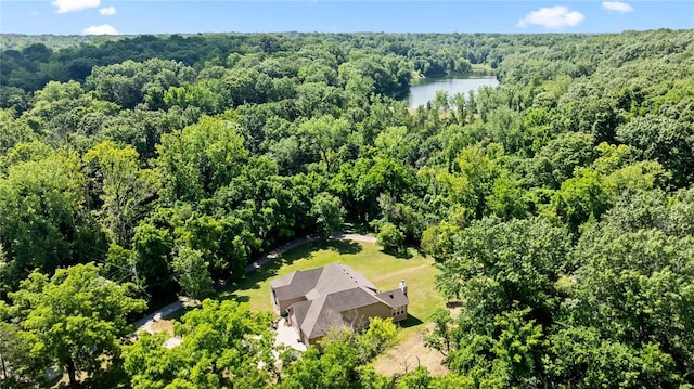 aerial view with a water view and a view of trees