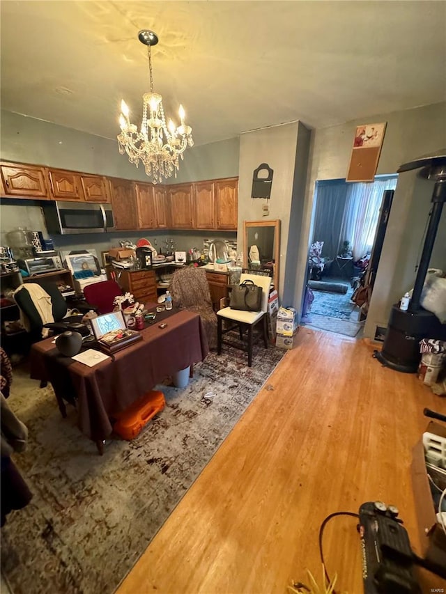 interior space featuring hardwood / wood-style flooring and a notable chandelier