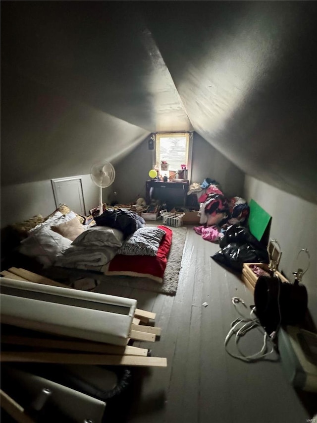 bedroom featuring lofted ceiling