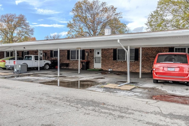 view of car parking with a carport