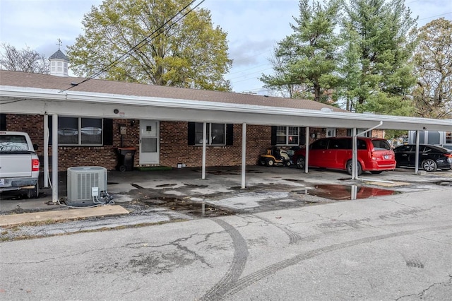 view of parking / parking lot with a carport