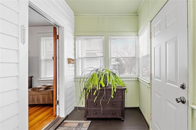 sunroom featuring a healthy amount of sunlight