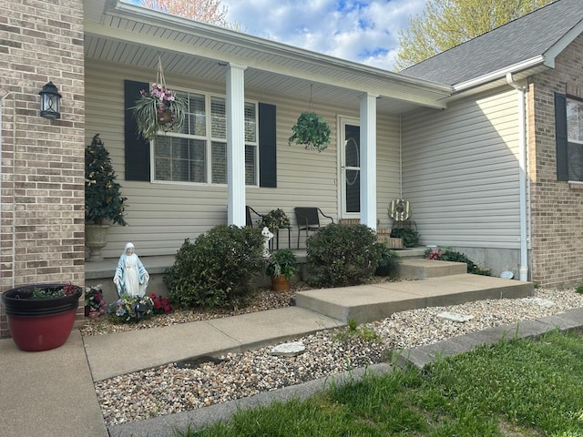 property entrance with covered porch