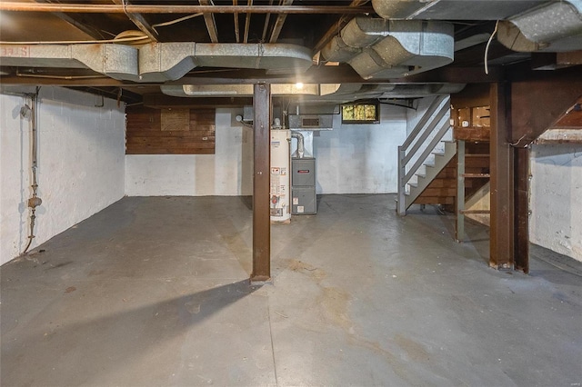 unfinished basement featuring stairs