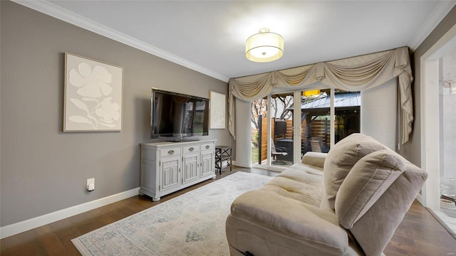 living room featuring dark hardwood / wood-style flooring and crown molding