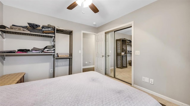 bedroom featuring carpet floors, a closet, and ceiling fan