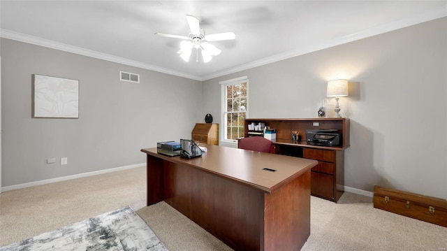 office space with light carpet, ceiling fan, and crown molding