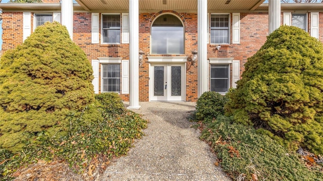 doorway to property featuring french doors