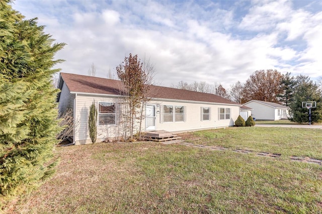 ranch-style house with a front yard