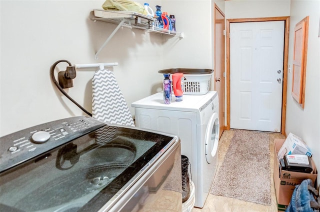 laundry room with independent washer and dryer