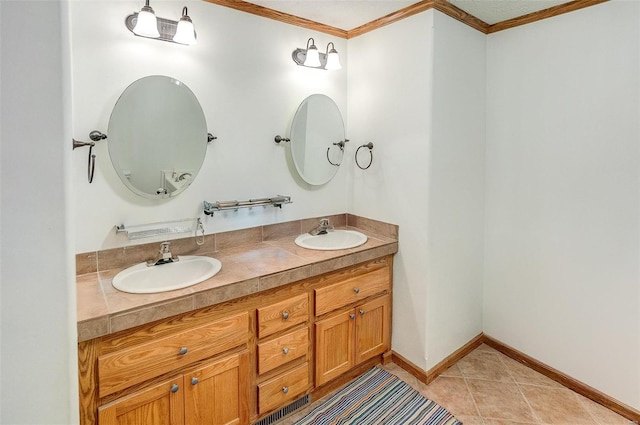 bathroom with tile patterned flooring, vanity, and ornamental molding